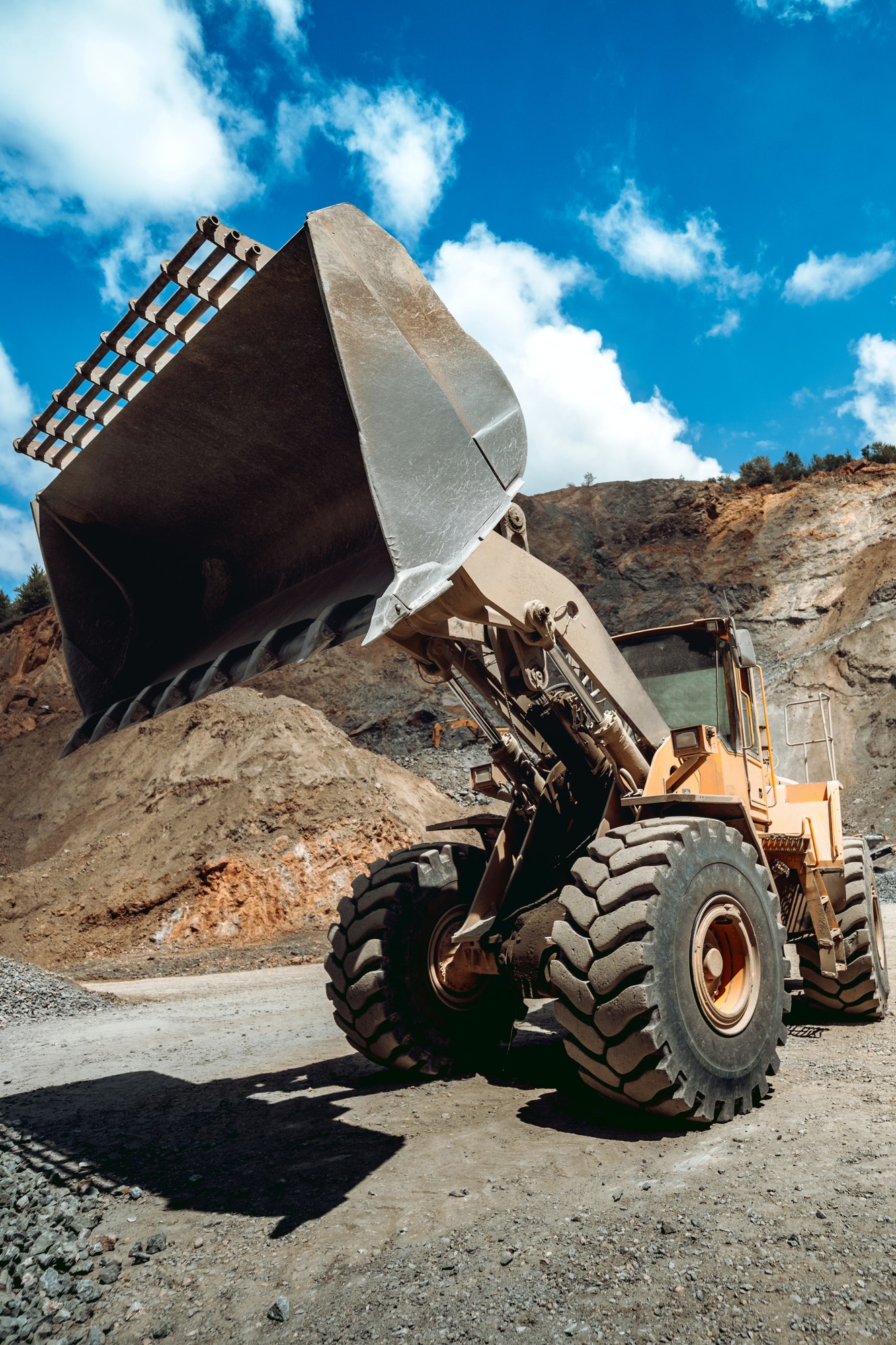 Wheel loader working at gravel during mining operations